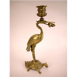 A BRASS SINGLE CANDLESTICK, VIETNAMESE