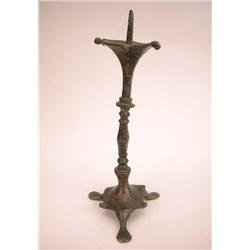 A BRONZE GOTHIC CANDLESTICK, CONTINENTAL