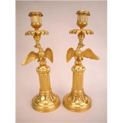 A PAIR OF BRASS CANDLESTICKS WITH GILT FINISH