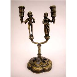 A RARE BRONZE CANDELABRUM, GERMAN, WITH MALE AND FEMALE FIGURES HOLDING CANDLE CUPS