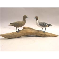 A MODERN CARVING OF NORTHERN PINTAIL DUCKS