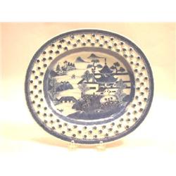 A CHINESE EXPORT PORCELAIN RETICULATED UNDERPLATE