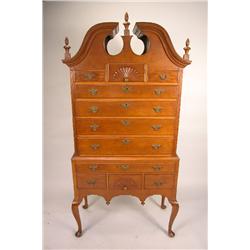 A QUEEN ANNE STYLE CARVED MAPLE FAN-CARVED BONNET-TOP HIGH CHEST OF DRAWERS AND EN SUITE DRESSING TA