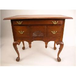 A CHIPPENDALE CHERRYWOOD BLOCKED DRESSING TABLE