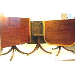 A GEORGE III STYLE CROSSBANDED THREE PEDESTAL DINING TABLE