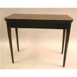 A GEORGE III INLAID MAHOGANY GAMES TABLE