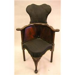 A GEORGE II CARVED WALNUT HIGH-BACK CORNER CHAIR