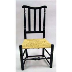 A BLACK-PAINTED MAPLE RUSH SEAT BANNISTER-BACK SIDECHAIR