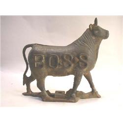 A CAST-IRON FIGURAL BULL-FORM MILL WEIGHT
