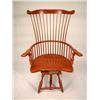 Image 1 : A DUCKLOE REVOLVING SALMON-PAINTED, COMB BACK WINDSOR-AVON CHAIR.