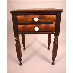 AN EMPIRE MAPLE AND MAHOGANY TWO DRAWER STAND.