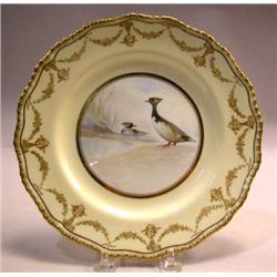 A SET OF EIGHTEEN ROYAL DOULTON BIRD PLATES