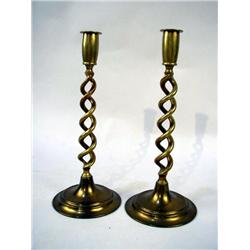 A PAIR OF ARTS & CRAFTS STYLE BRASS ROPE TWIST CANDLE STICKS