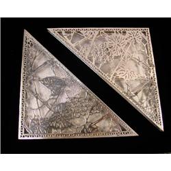 A GROUP OF FOUR TIFFANY STUDIOS METAL DESK BLOTTER EDGES