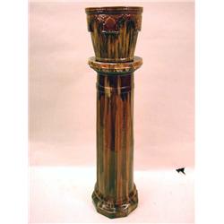 A ROCKINGHAM GLAZE JARDINERE WITH PEDESTAL