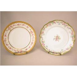 A SET OF EIGHT LIMOGES LUNCHEON PLATES
