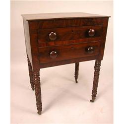 A FEDERAL CARVED MAHOGANY TWO-DRAWER STAND