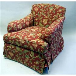 A CONTEMPORARY CLUB CHAIR AND MATCHING OTTOMAN