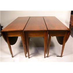 A FEDERAL HIGHLY FIGURED MAHOGANY THREE-PART BANQUET TABLE
