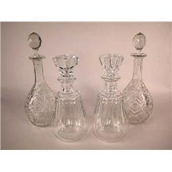 TWO PAIRS OF BACCARAT CUT GLASS STOPPERED DECANTERS