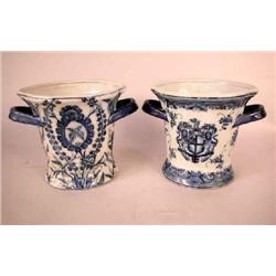 A PAIR OF CHINESE BLUE AND WHITE HANDLED POTS