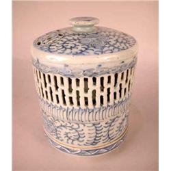 A CHINESE RETICULATED VESSEL ON STAND