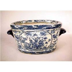 A PAIR OF CHINESE BLUE AND WHITE HANDLED PLANTERS