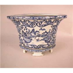 A CHINESE BLUE AND WHITE QUATREFOIL CACHE POT ON STAND
