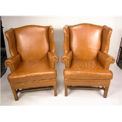 A PAIR OF CHIPPENDALE STYLE UPHOLSTERED EASY CHAIRS