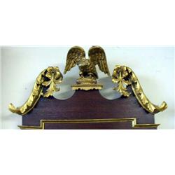 A GEORGE III STYLE PARCEL GILT MAHOGANY CONSTITUTION MIRROR