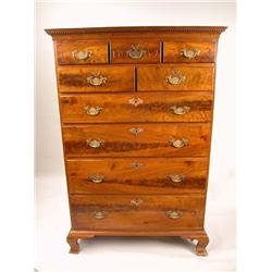 A CHIPPENDALE HIGHLY FIGURED WALNUT TALL CHEST OF DRAWERS