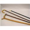Image 1 : A GROUP OF FOUR WALKING STICKS