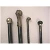 Image 1 : A GROUP OF FOUR EBONIZED WALKING STICKS