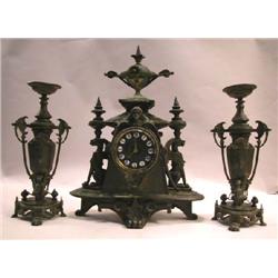 A VICTORIAN PATINATED METAL THREE PIECE GARNITURE SET