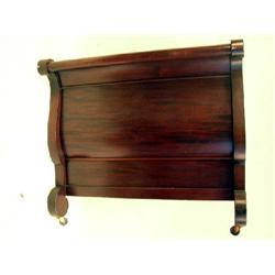 AN EMPIRE MAHOGANY SLEIGH BED