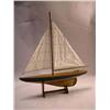 Image 1 : A BLACK AND WHITE DECORATED SAILBOAT