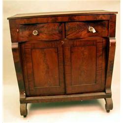 AN EMPIRE MAHOGANY SIDEBOARD