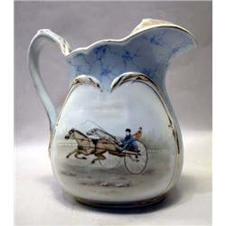 AN F.L. BEATTY AND HORSE TROTTER WATER PITCHER