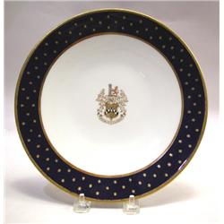 A SET OF FOUR COBALT DECORATED ARMORIAL PLATES
