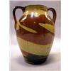 Image 1 : A YELLOW AND BROWN GLAZED DOUBLE HANDELED REDWARE POTTERY VASE