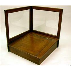A MAHOGANY AND GLASS BANK TELLER'S CORNER BOOTH