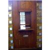 Image 1 : AN OAK POSTAL CLERK'S WINDOW AND MAIL BOXES