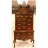 Image 1 : A CHIPPENDALE STYLE ELABORATELY-CARVED BONNET-TOP HIGH CHEST OF DRAWERS