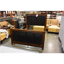 ASHLEY FLOOR MODEL QUEENSIZE PANEL BEDFRAME, TEAR IN HEADBOARD LEATHER, RETAIL $1198