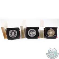 1971, 1974 & 1977 Canada Cased Silver Dollars (1971 coin is toned & capsules may be lightly scratche