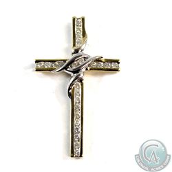 Cross pendant fashioned in 14-karat Yellow Gold with Rhodium plated settings 3.1g, contains 24x .02 