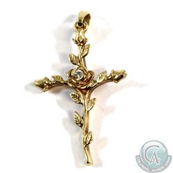 Floral Cross Pendant fashioned in 14-karat Yellow Gold, 3.6g. Decorated w/ leaves and buds with rose