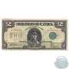 Image 1 : DC-26d 1923 Dominion of Canada $2, Green Seal 1. S/N: H-664315/A. Note is VF condition with some wax