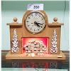 Image 1 : VINTAGE UNITED FIGURAL MANTLE CLOCK