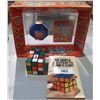 Image 1 : 2 RUBIKS PUZZLES AND BOOK